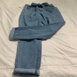 New with tags, High Rise Paperbag Waist Denim Jeans, size Medium.